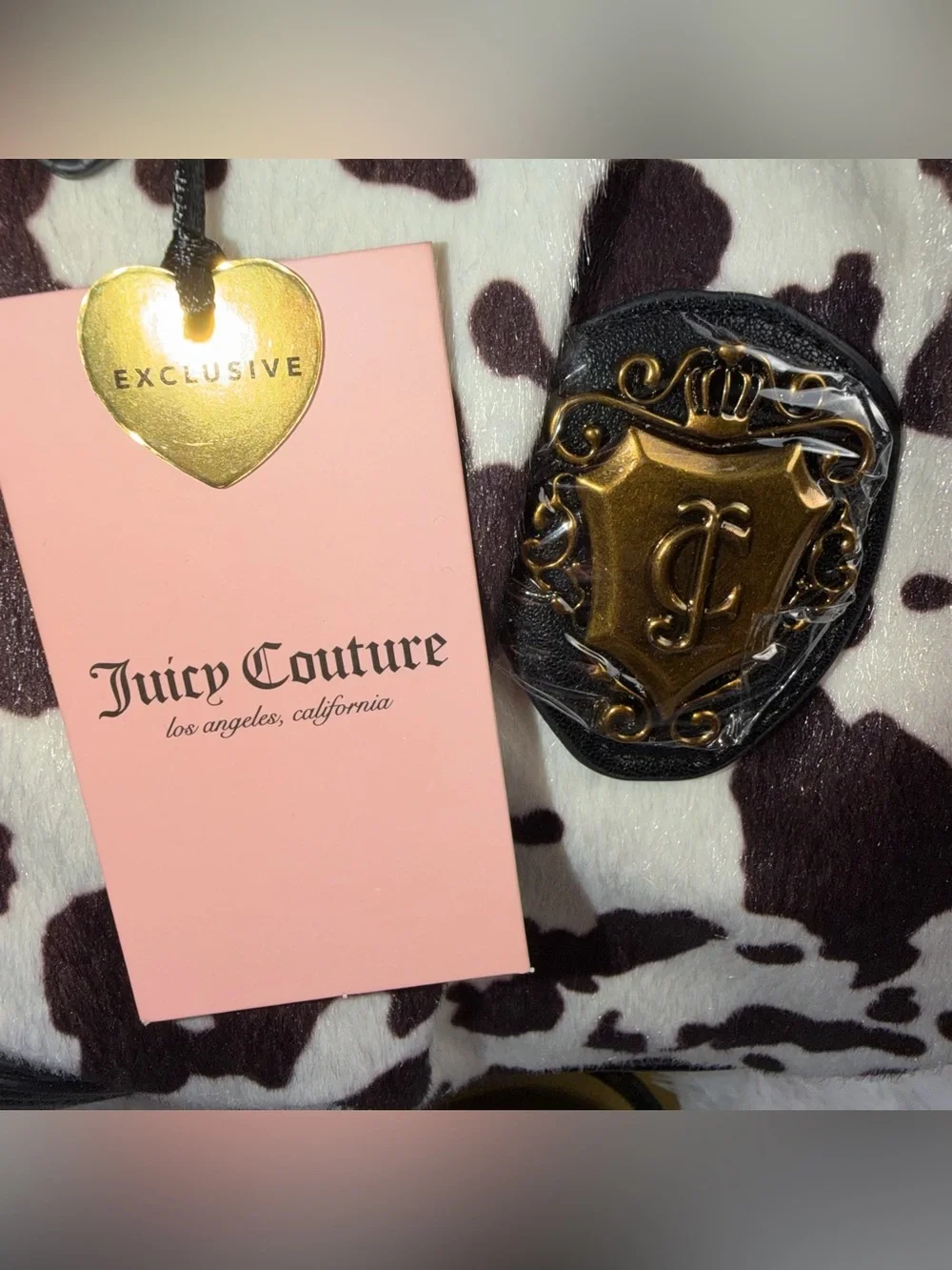 Juicy Couture Black & White Cow Print Satchel with Pink Bow Charm